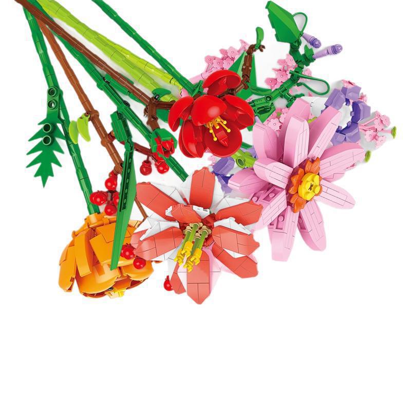 Colorful flower arrangements made from interlocking bricks on a white background